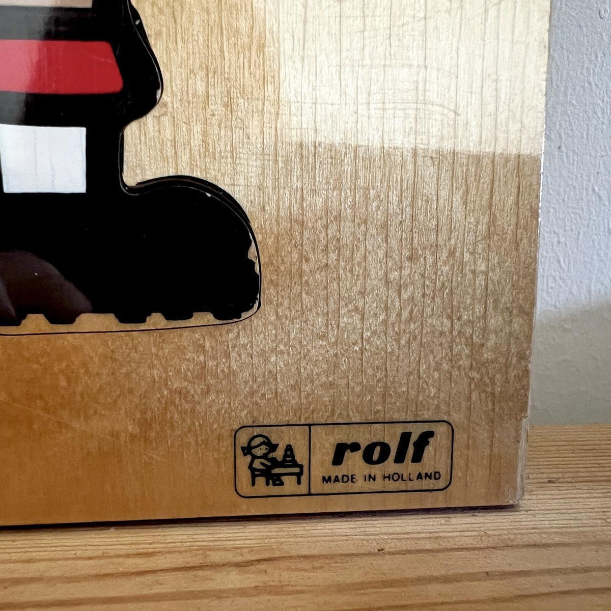 Charming vintage wooden puzzle by Rolf of Holland featuring a footballer and their dad (or coach!).
