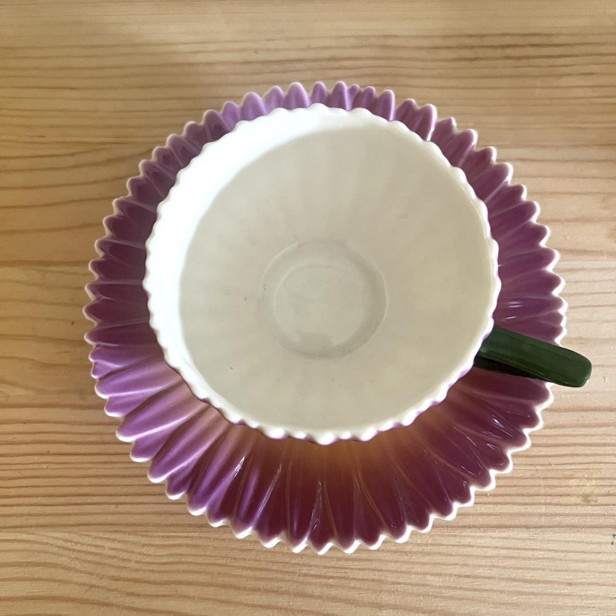 A lovely floral teacup and saucer from the Conservatory Collection by Two’s Company.