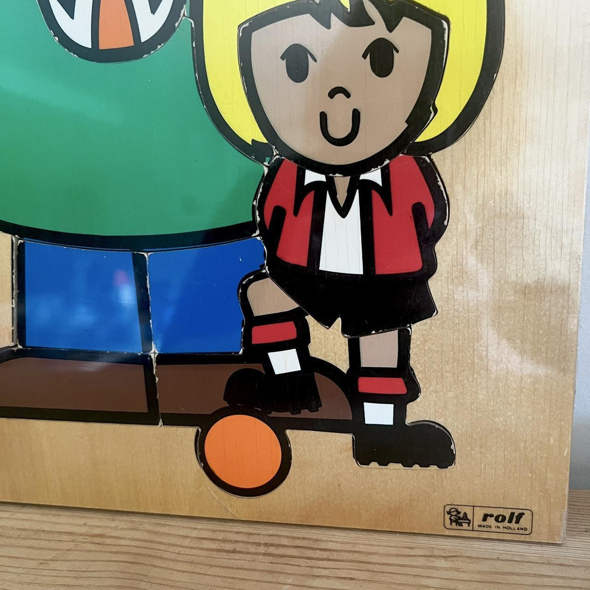 Charming vintage wooden puzzle by Rolf of Holland featuring a footballer and their dad (or coach!).